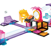 Colorful toy track set with various obstacles on a white background