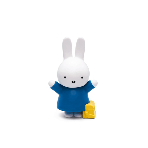 Miffy Tonie figure in blue dress with yellow accessory on white background