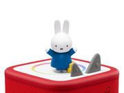 Miffy character figure in blue outfit on red Toniebox speaker with accessories