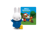 Miffy rabbit figure in blue outfit with yellow bag next to Miffy's Adventures Big and Small book cover
