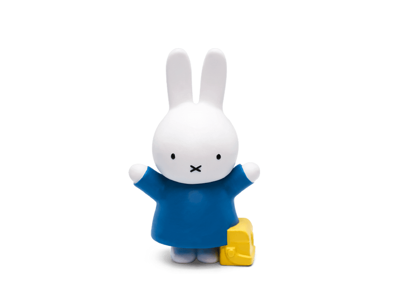 Miffy Tonie figure in blue outfit with yellow block on plain background