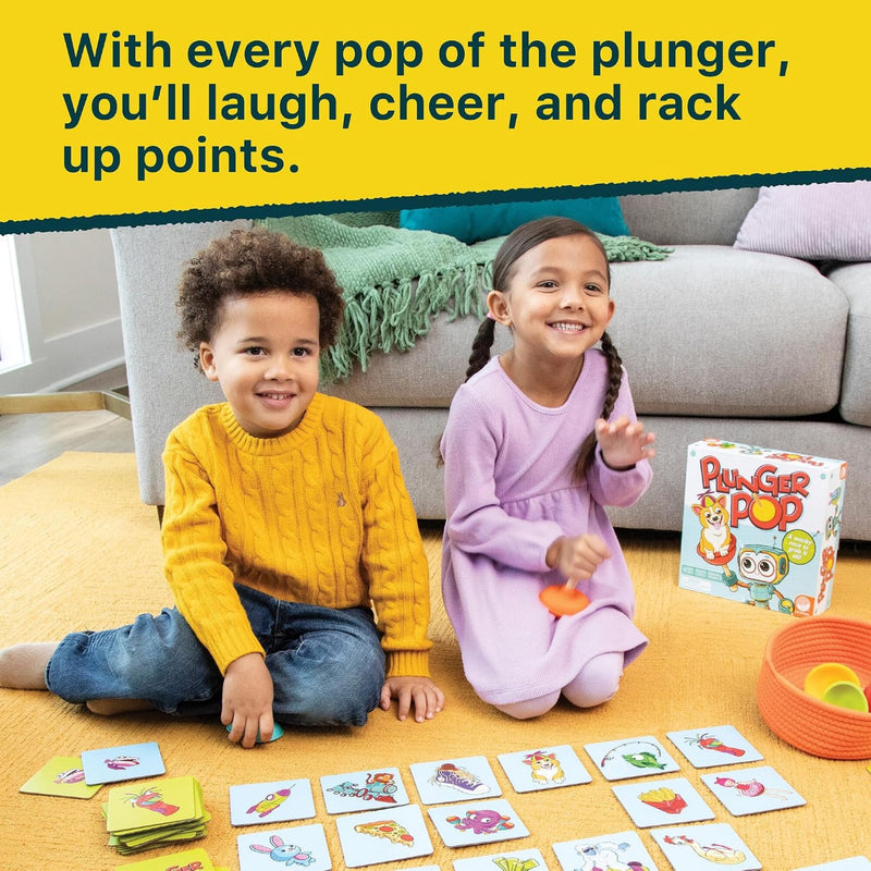 Two children playing with a game called 'Plunger Pop' on the floor.
