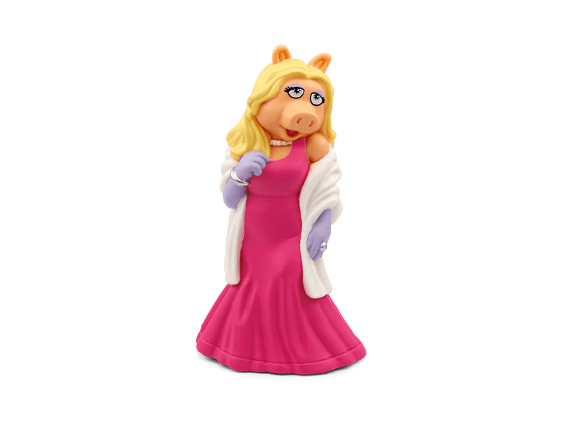 Miss Piggy Tonie figure in pink dress with white stole on green background