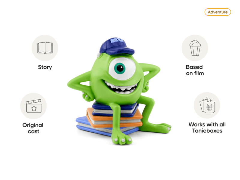Green one-eyed Mike Wazowski Tonie figure with college hat sitting on books