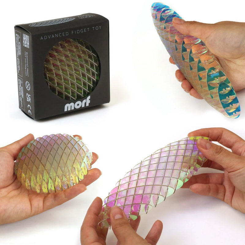Morf small fidget worm in unicorn color (shimmery rainbow) and pattern held by hands, next to packaging labeled 'morf'.