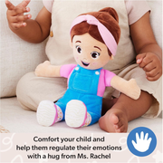 Plush toy (Ms. Rachel) resembling a child in blue overalls and pink shirt held by a child