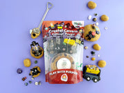 Crystal Cavern KidDough play kit with mining tools and gemstones on purple background
