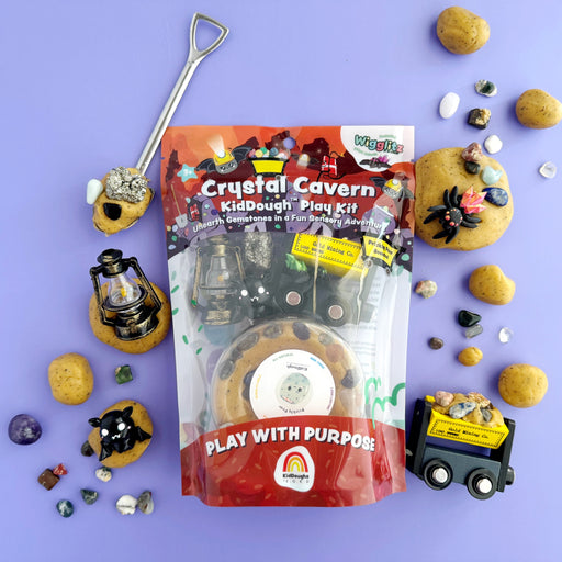 Crystal Cavern KidDough play kit with mining tools and gemstones on purple background