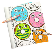 Double-ended OOLY crayons shown alongside colorful donut-themed coloring pages on black background