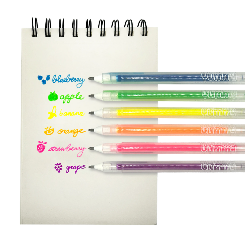 Six colorful scented gel pens with fruit names and icons displayed on white notepad