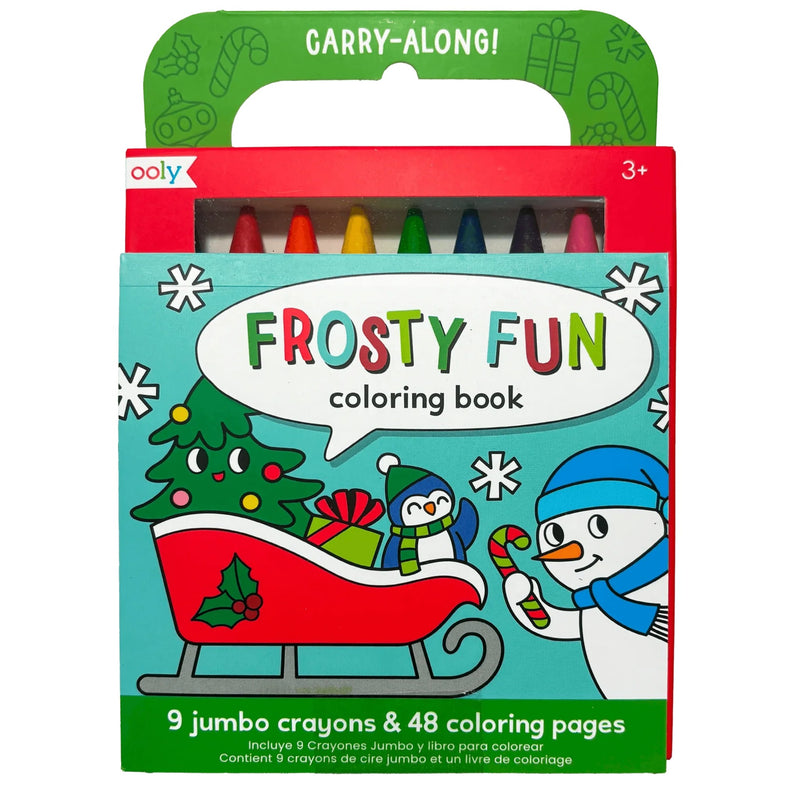 OOLY Frosty Fun Carry-Along coloring book in its retail packaging, featuring a festive Christmas illustration with a snowman, penguin, tree, and sleigh on a turquoise cover, with a green handle and visible multicolored jumbo crayons at the top.
