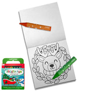 A festive coloring book set featuring an open white coloring page with a black outline of a reindeer in a wreath, two Ooly crayons (one orange, one green), and the retail packaging for the 'Frosty Fun' coloring book on a clean white background.