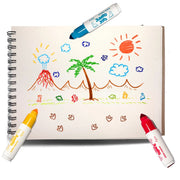 A spiral-bound sketchbook with a colorful childlike drawing of a volcano, palm tree, sun, clouds, and small figures, surrounded by three markers on a white background.