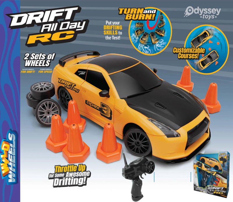 Odyssey Toys Drift All Day RC remote control car toy set, featuring a yellow and black sports car, orange traffic cones, a black remote control transmitter, spare wheels, and the product packaging box on a blue and white graphic background.