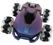 A futuristic remote-controlled tank vehicle with a metallic purple and blue body, black front grille, and four large black and clear snowmobile-style wheels, shown on a plain white background.