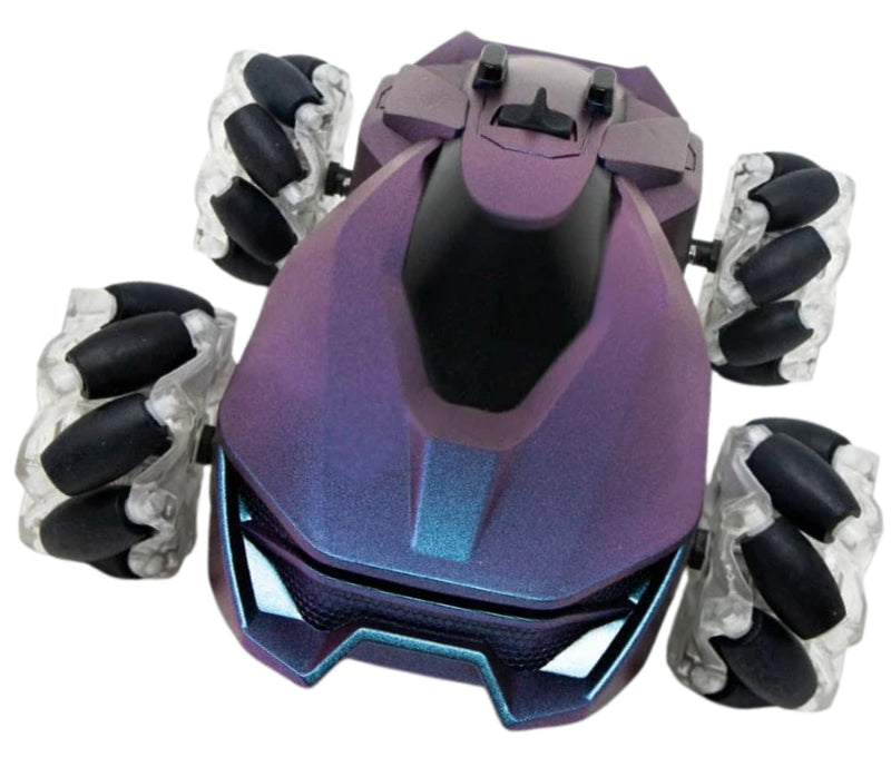 A futuristic remote-controlled tank vehicle with a metallic purple and blue body, black front grille, and four large black and clear snowmobile-style wheels, shown on a plain white background.