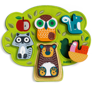 Oski puzzle from DJECO with wooden animal puzzle pieces on green felt background. 