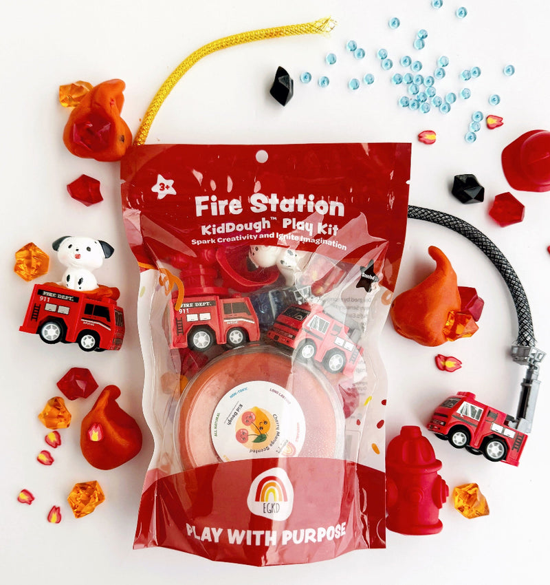Fire Station KidDough kit pieces and colorful dough arranged for sensory play
