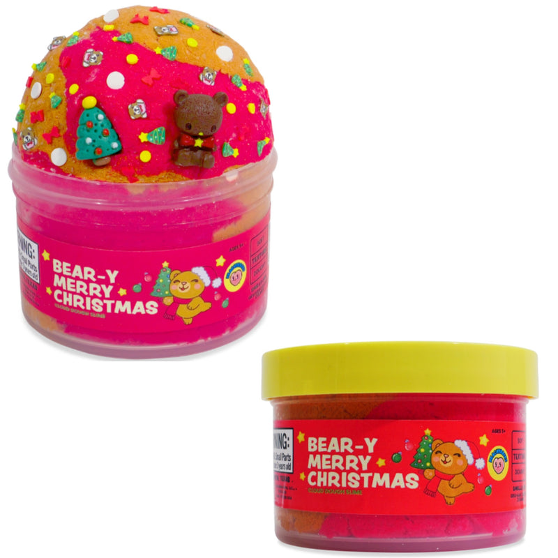 Peachybbies Bear-Y Merry Christmas slime shown on a white background, one open to display the pink and orange slime with colorful sprinkles and a small bear figure, and one closed with a yellow lid showing the pink jar and label.