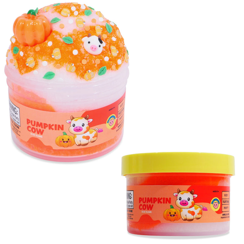 Peachybbies 'Pumpkin Cow' slime shown on a white background, one open and decorated with a small pumpkin and candy corn, and one closed with a yellow lid.