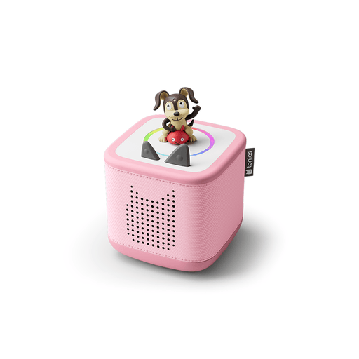 Pink TonieBox audio player with cartoon dog character on top on white background