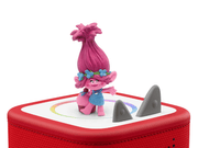 Pink Trolls Poppy Tonie figure on red Toniebox speaker with white background