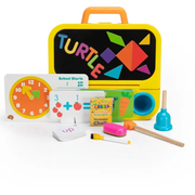 Pretendables colorful educational toy set with a chalkboard, clock, and various learning tools on a white background.