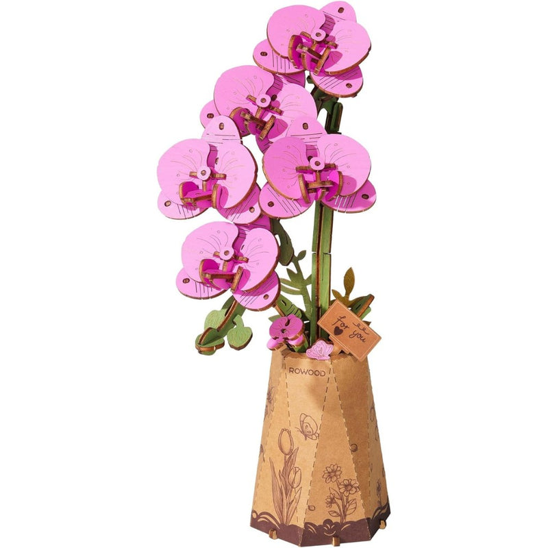 3D paper flower model of pink orchids in a vase on a white background