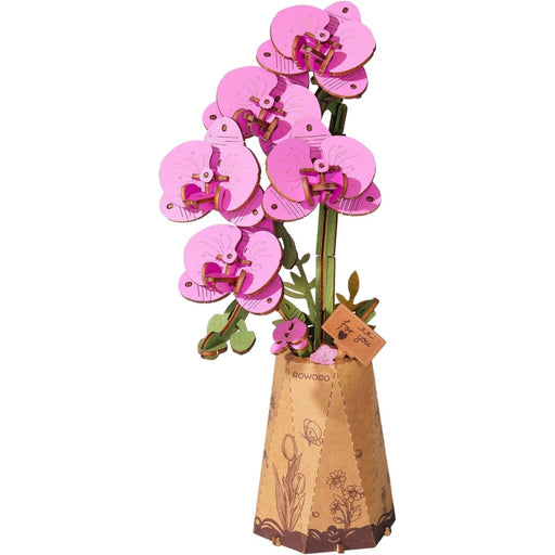 3D paper flower model of pink orchids in a vase on a white background