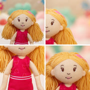 Groovy Girls Rose soft doll with blonde yarn hair and pink butterfly dress shown in four close-up angles
