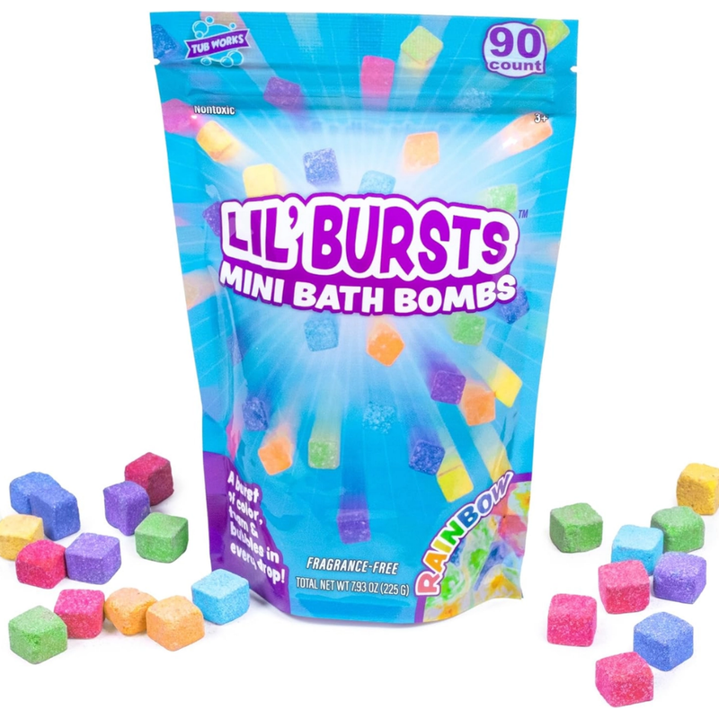 Bag of Lil' Bursts mini bath bombs with colorful bath bombs around on a white background.