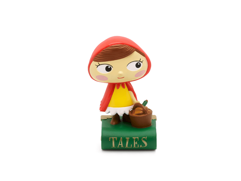 Tonie figurine of Little Red Riding Hood with red cape on green Tales base
