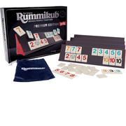 Rummikub premium edition game set with tiles and packaging on a white background