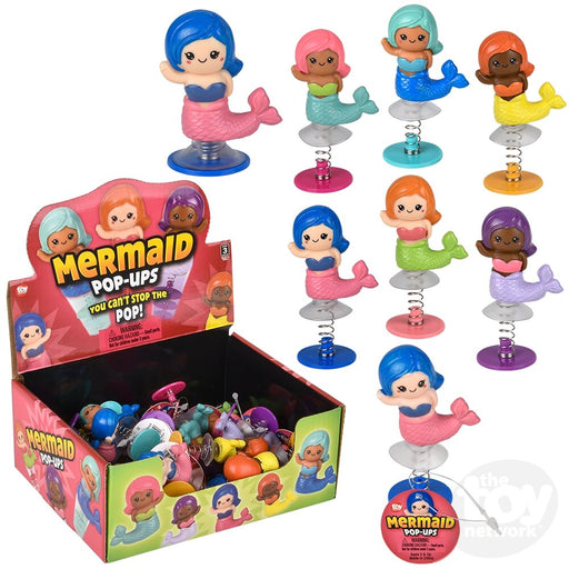 Mermaid Pop-Ups toy collection showing colorful bouncing mermaid figures with packaging display
