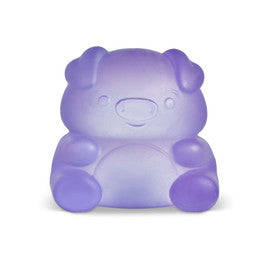 Purple translucent bear-shaped squishy toy with cute kawaii face on white background
