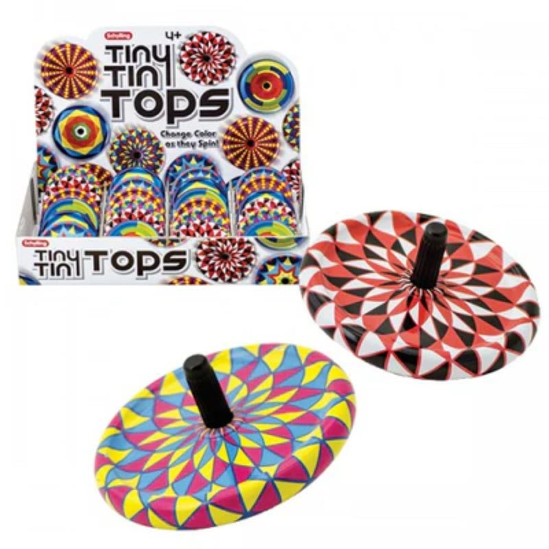 Box of colorful Tiny Tin Tops along with a close up of two of them on a white background. 