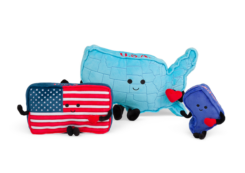 Three cute plush toys: American flag, USA map, and blue state mascots with hearts