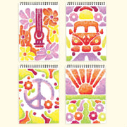 Four spiral-bound notebooks with colorful dotted groovy designs including guitar, van, peace sign, and sun