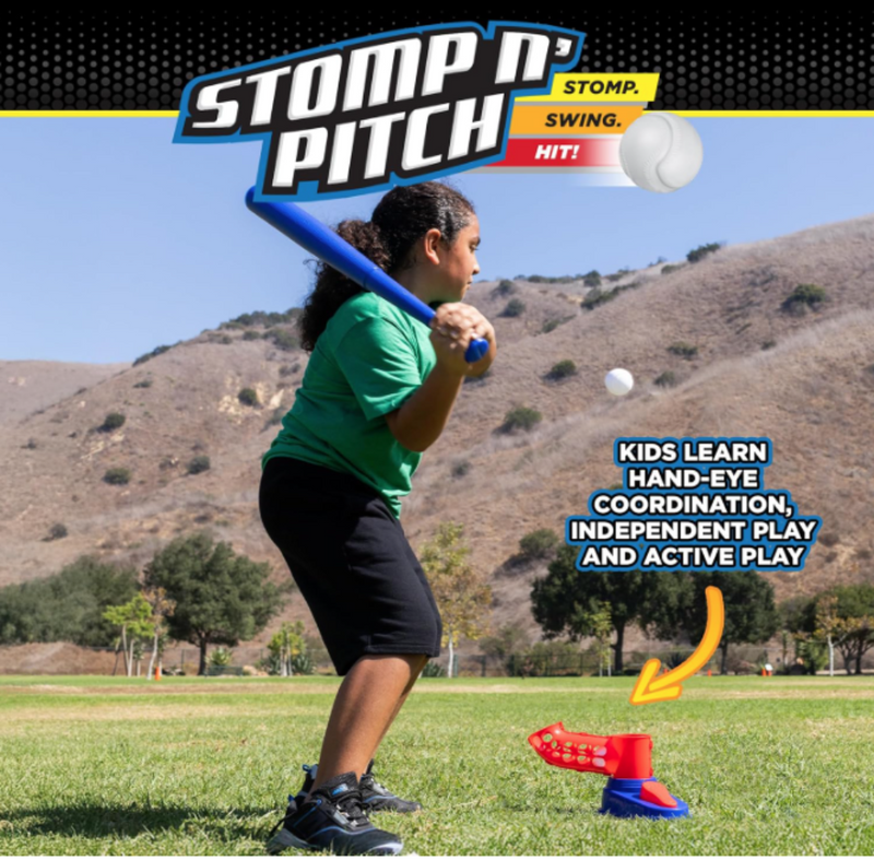Child swinging blue bat at ball launched by Stomp N Pitch foot-activated pitching toy outdoors