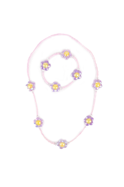 Pink beaded necklace and bracelet set with purple flower charms and yellow centers