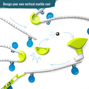 Gecko Run marble run components with white tracks, green curves, and blue connectors