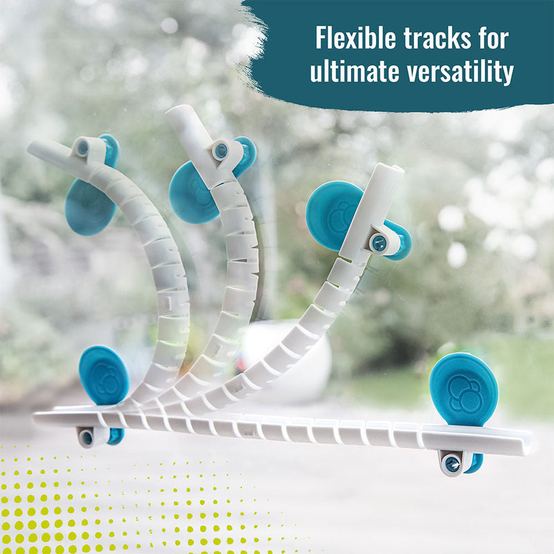 White and teal flexible track segments with suction cups for marble run construction