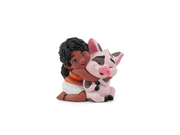 Tonie figurine showing young girl character hugging pink pig on white background