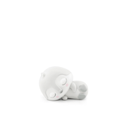 White sleeping penguin Tonie audio figure lying on side with closed eyes