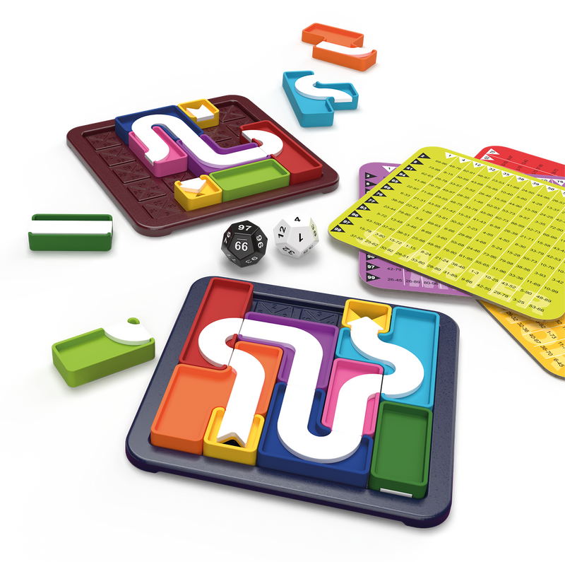 Genius Connection puzzle game with colorful tetris-like pieces, dice and reference cards displayed