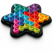 A star-shaped black silicone mold with triangular slots, filled with colorful plastic pieces in blue, green, purple, red, orange, yellow, and pink, shown on a white background.