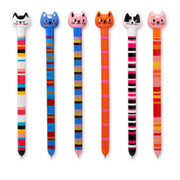 Six colorful cat-shaped pens arranged in a row on a plain white background. Each pen has a different cat face design on the top and a striped barrel in various color combinations.