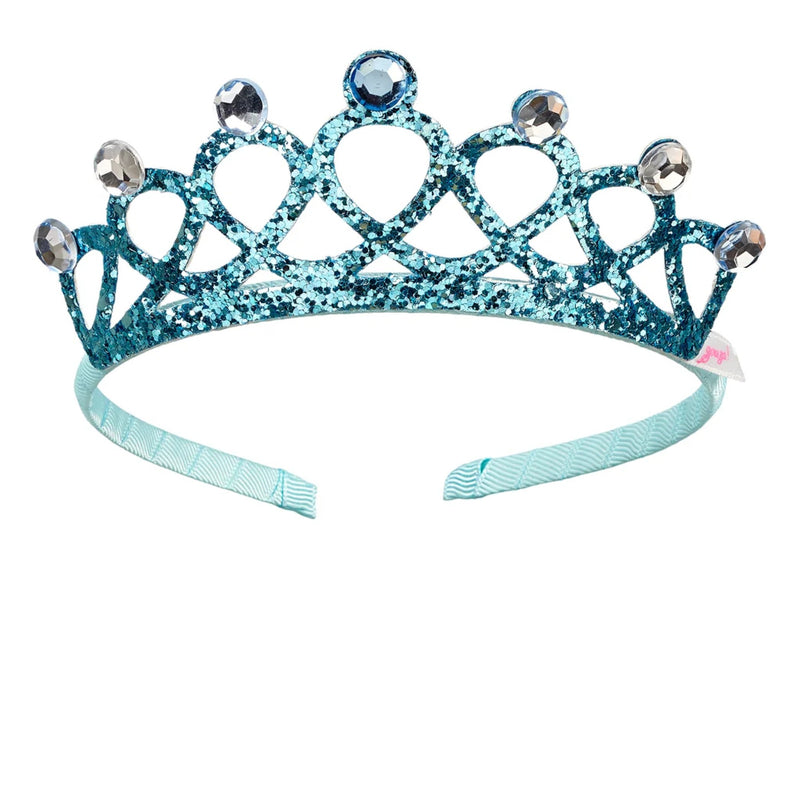 A light blue glitter tiara crown with clear rhinestone-like gems at the tips and a matching light blue ribbon headband, shown on a plain white background.