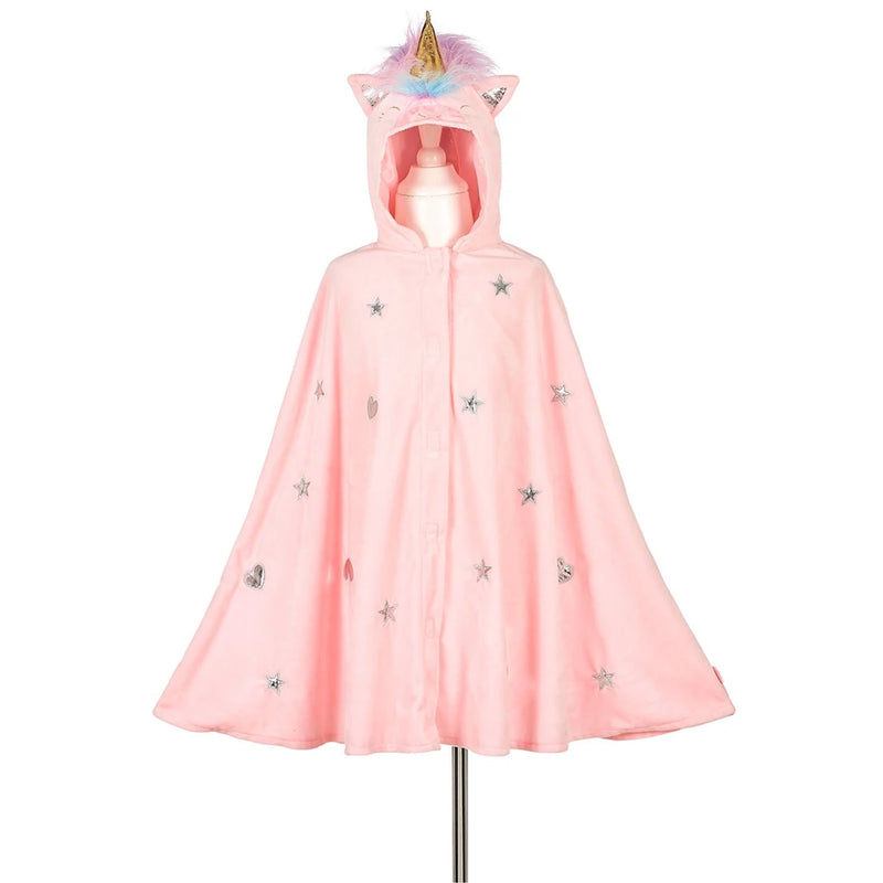 A pink hooded cape with a unicorn horn and ears, displayed on a mannequin against a white background. The cape is decorated with silver star and moon appliqués.