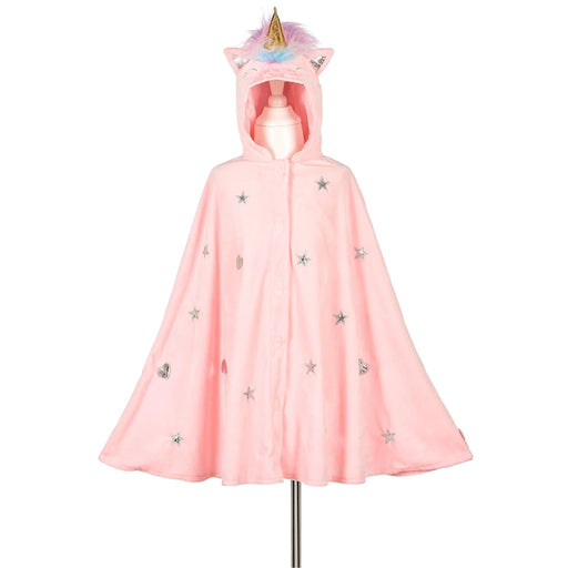 A pink hooded cape with a unicorn horn and ears, displayed on a mannequin against a white background. The cape is decorated with silver star and moon appliqués.